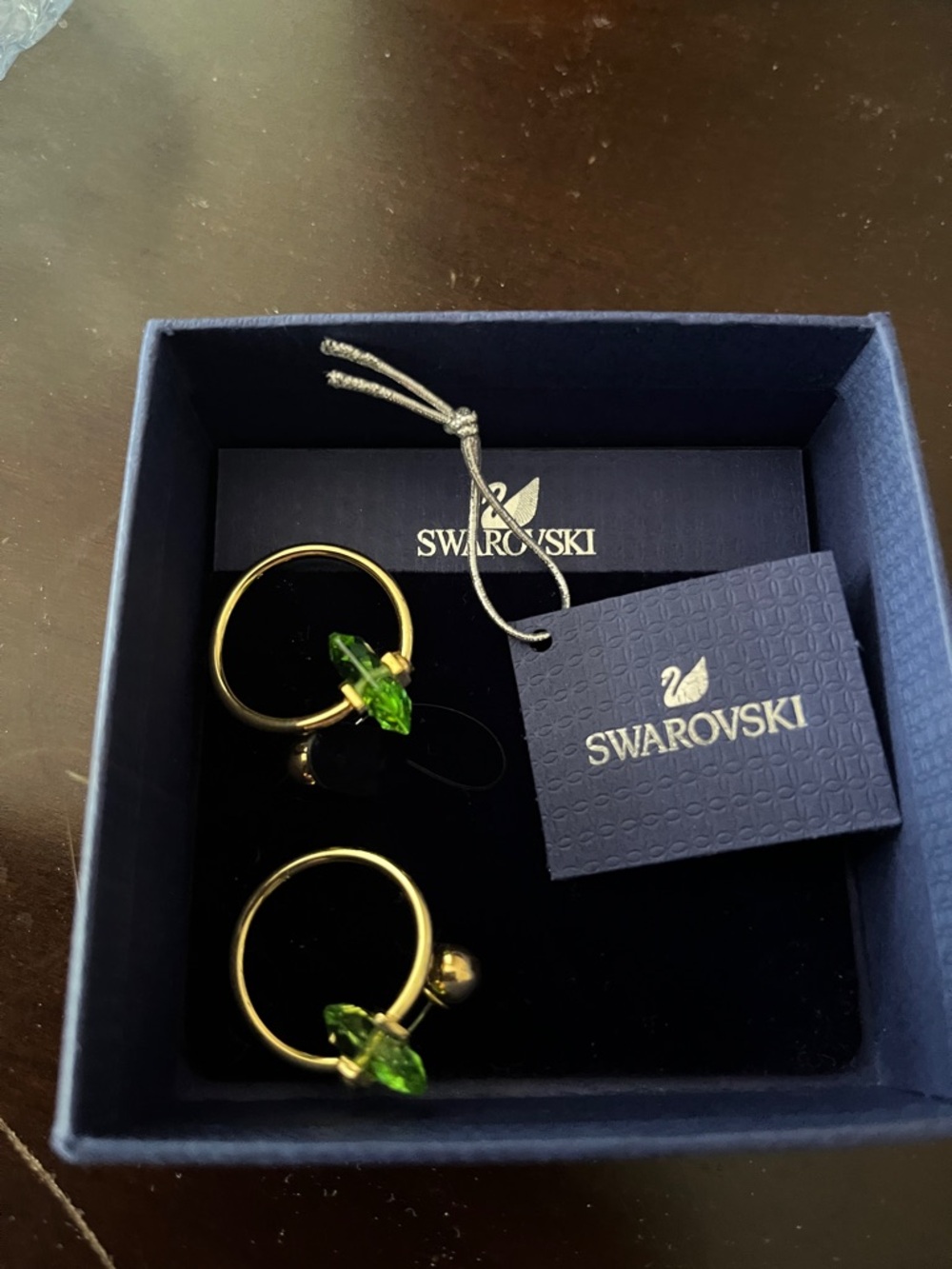 Swarovski Gold Hoop Earrings with Green Crystal Leaf Accents